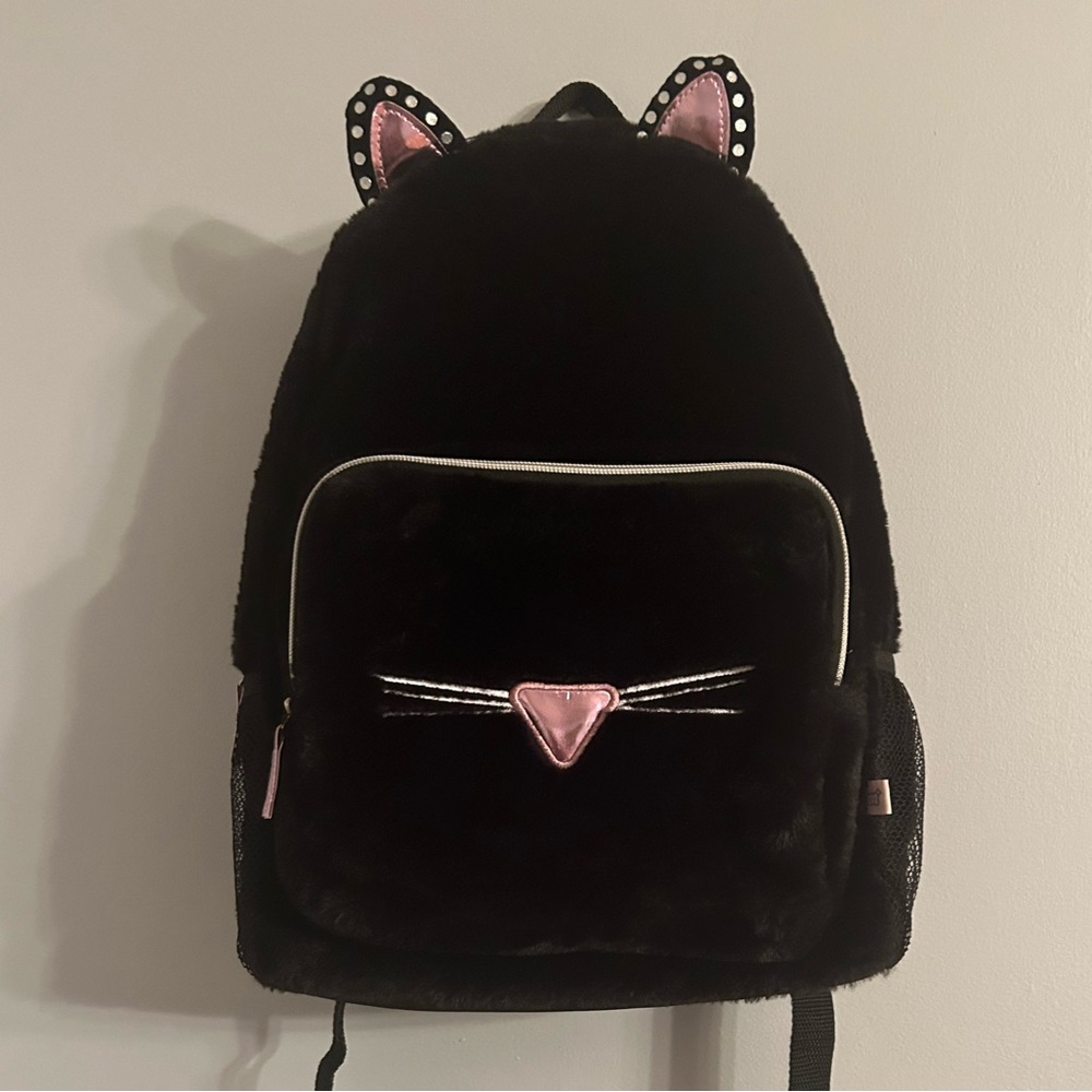 More than Magic black cat backpack